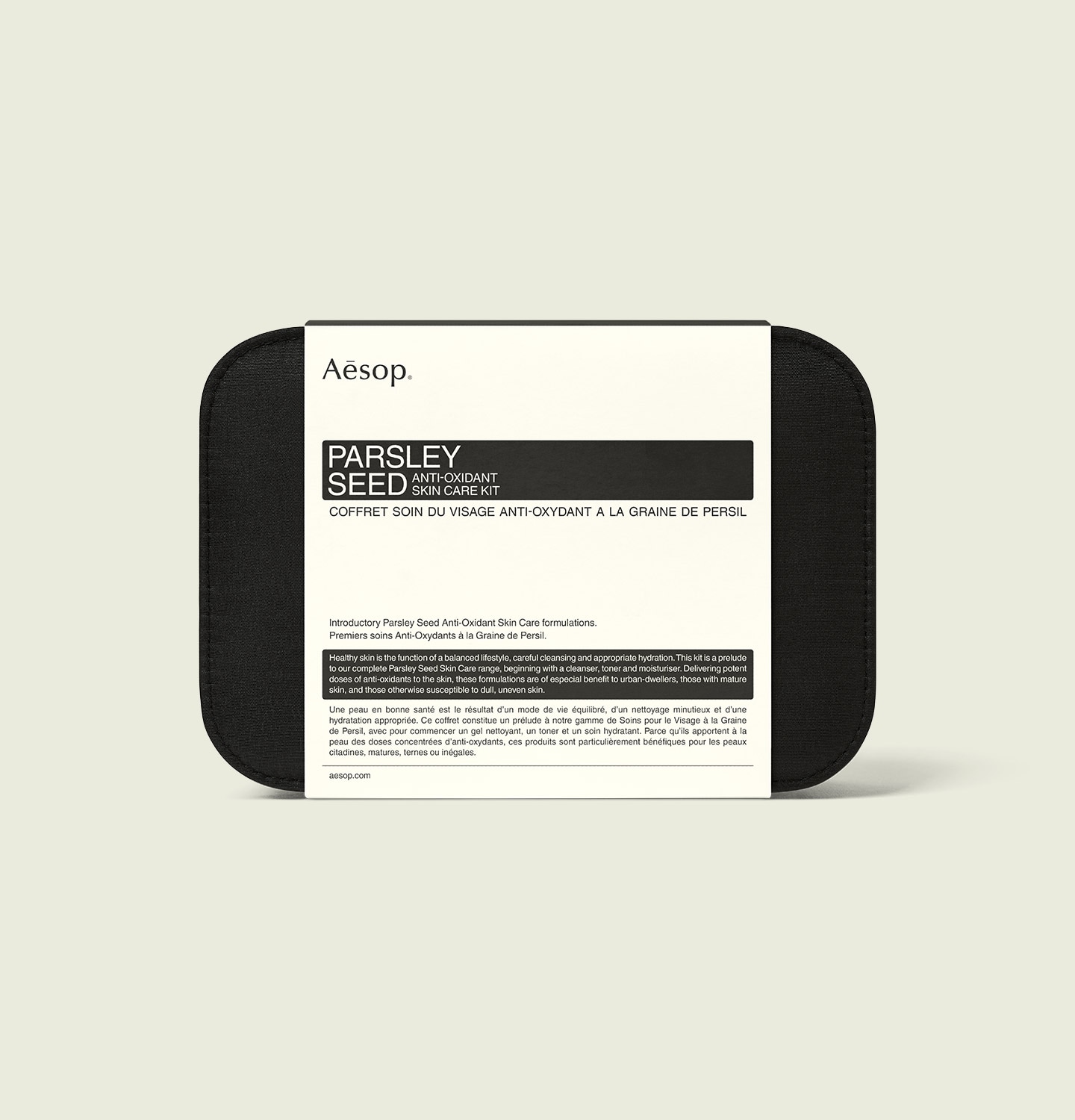 A sleek black microfibre case with an alabaster sleeve.